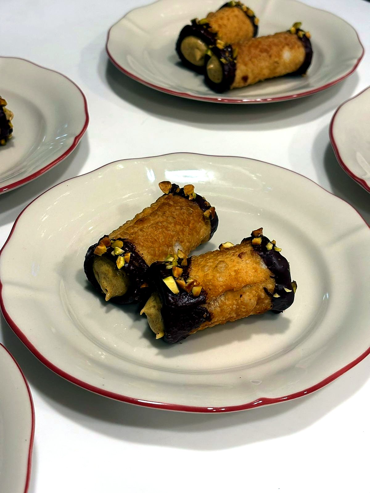 Aagara plated dessert with crisp pastry, chocolate, and pistachio